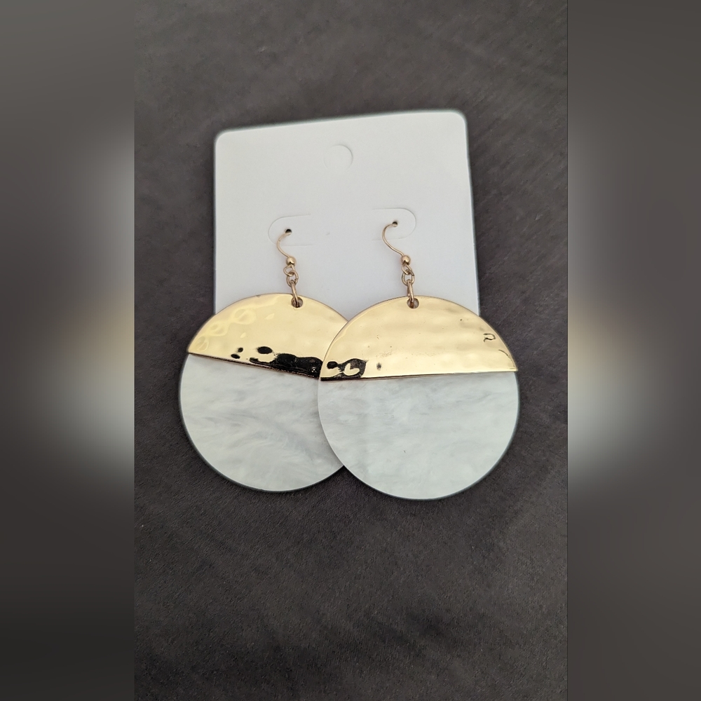White and gold tone earrings